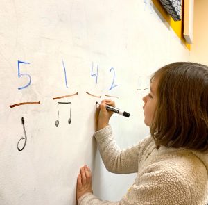 BMF student playing a music theory game